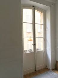 Porte Fenetre 2 Vantaux Cintree Gueule De Loup Petits Bois Colles Fermeture Par Espagnolette Les Forg Porte Fenetre Bois Fenetre En Bois Decoration Fenetre