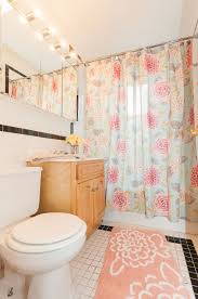 Whether in need of a reading nook, a place to gab on the phone, or a simple spot to relax, turning a corner into a soft, whimsical space is a great choice for a teenage girl's bedroom. The Perfect Girly Bathroom Great Lighting Pastel Colors And Floral Print This Chicago Apartmen Girly Bathroom College Apartment Bathroom Apartment Bathroom