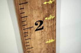 I made a simple (and adorable) diy wooden growth chart ruler to keep track of my son's growth throughout the years. Etsy Order Diy Project Creating Our Family S Mobile Growth Chart Saving Amy