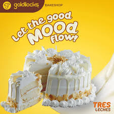 The cake is iced with a combination of plain and chocolate whipped cream marbled. Goldilocks Let The Good Mood Flow With Our Tres Leches
