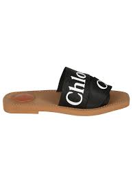 Chloe Logo Slippers In Black Modesens