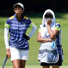 Posting a picture of aditi in an animated discussion with her mother and a loaded golf bag lying in front of them. Mzyvof8ltju8km