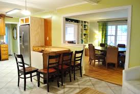 A tile floor, dark wood cabinets, and light colored granite countertops completed the transformation, changing the over all feel of not just the kitchen, but the home as well. How To Trim Out A Cased Opening And A Half Wall Young House Love