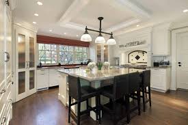 If you have a big kitchen island, if it's built up of several rectangles, you may place a seating or dining area right inside it, it will be a very cozy and comfy eating corner or breakfast corner. 101 Kitchen Islands With Seating For 2 3 4 5 6 And 8 Chairs And Stools Home Stratosphere