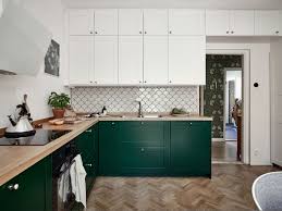 The soft tones and natural materials with classic details. Forest Green Kitchen Coco Lapine Design Hardwood Floors In Kitchen Green Kitchen Kitchen Interior