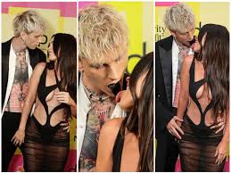 Megan fox appears visibly irritated and displeased with boyfriend machine gun kelly at the billboard music awards in los angeles despite the couple putting on a loved up pda display on the red carpet. Cqfmw Nls2fmm