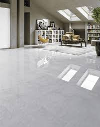 Adding a focal point to a room is easy with the light grey marble laminate floor from the verona tile range. Grey Marble Effect Xl Polished Porcelain Floor Tile Porcelain Flooring Floor Tiles Living Room Modern Marble Tile Floor