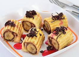 Resep Mudah Cara Membuat Roti Gulung Pisang Coklat Oya selain bisa dijadikan camilan untuk anak, resep jajanan ini bisa untuk ide jualan yang menguntungkan, bagaimana apakah anda tertarik dengan resep ini? cara membuat roti gulung pisang coklat