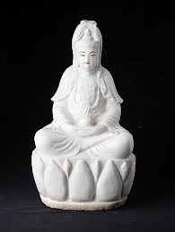Guan yin is carrying lotus and holding one vase to. Information About Guan Yin Avalokiteshvara Bodhisattva