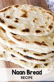 Naan Is A Traditional Indian Flat Bread That Is Pillowy Soft And Delicious This Easy Naan Bread Recipe Recipes With Naan Bread Plain Yogurt Recipes Naan Bread