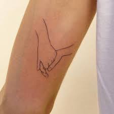 Find over 100+ of the best free hand tattoo images. Fine Line Holding Hands Tattoo