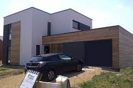 Les murs sont en briques creuses et crépis. Tendances Bardage Bois Et Crepi Photo N 2 Facade Maison Maisons Exterieures Maison Cubique