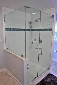 The timeless look of marble is balanced with the delicately colored glass mosaic listello. Stellar Classic Tiled Shower Stellar Remodeling And Design