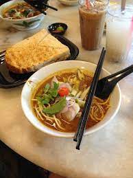 Some goods of this kopitiam were sold on selves at the side of this cozy eatery. Tuna Toast And Asam Laksa With Iced Barley And Iced Coffee Bild Von Hai Peng Kopitiam Kuantan Tripadvisor