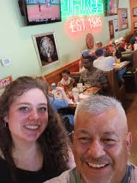 What is the address of the new location of The Grapevine Bar in Dallas?