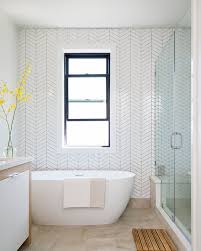Marble carrara fiberglass/plastic composite bathtub wall surround (common: Featuring Wrap Around Walls Of Chevron Tiles Free Floating Soaking Tub And Two Toned Custom Va Bathrooms Remodel Bathroom Renovations Bathroom Remodel Master