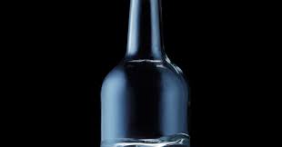 Display your design in a more efficient way on this mockup of a clear glass bottle with vodka. What S Inside Vodka Wired