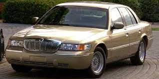 But that was a mile or so back now. Used 2000 Mercury Grand Marquis Harvest Gold Metallic For Sale Near Collinsville P4382 1