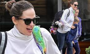 Jennifer Garner struggles to wipe the smile off her face during school  pickup
