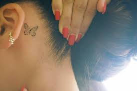 This tiny butterfly tattoo is pretty cute hiding behind the ear. Vanessa Morgan S Fine Line Butterfly Tattoo