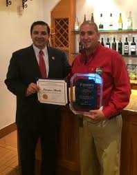 Congressman Cuellar Presents High Achieving Award To Laredo Olive Garden Manager Rep Henry Cuellar