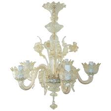 Curious blue four arms murano glass chandelier with chrome finishes. Vintage Murano Glass Chandelier Of Murano Crystal With Gold Inclusion Swank Lighting