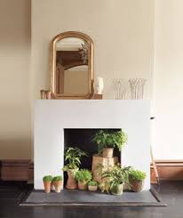 Dress Up An Unused Fireplace Unused Fireplace Simple Fireplace Empty Fireplace Ideas