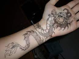 Chinese and japanese represent it as a kind of spirit, goodwill, strength, and balance. 30 Awesome Dragon Tattoo Designs Cuded Dragon Tattoos For Men Dragon Hand Tattoo Dragon Tattoo Wrapped Around Arm