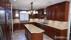 Cherry wood cabinets give any kitchen a rich, warm glow, but over time, they can dull in appearance. Santa Cecilia Granite Kitchen With Cherry Cabinets Marble Com