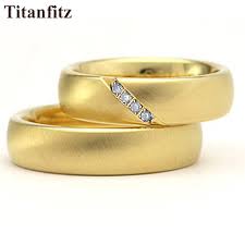 Small diamonds go halfway around the band. Top Quality Custom Made His And Hers Yellow Gold Color Health Titanium Wedding Rings Sets For Couples Marriage Alliances Ziloqa Makeup Healthcare Products Surgicalmask Pm2 5mask Kn95mask