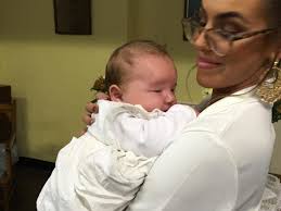 Baby baptised wearing 19th century family heirloom gown