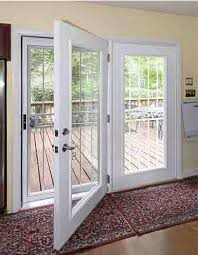 French single patio door with screen. Centered Hinge Patio Doors Patio Door Installation