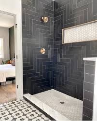 There are some nashville remodeling contractors that charge much higher than the average cost of bathroom remodel prices. Bathroom With A Black Herringbone Tiled Shower Nashville Tennessee In 2021 Black Tile Bathrooms Bathroom Remodel Master Shower Tile