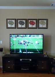 Decorating Around A Flat Screen Tv Tree Prints Were Made In Custom Colors By Michelle Han Who Is On Etsy Decor Around Tv Tv Gallery Wall Cool Walls