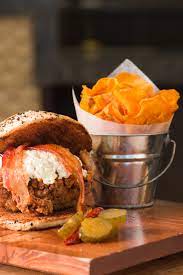 Down in mobile, they're all crazy, because the gulf coast is the kingdom of monkeys, the land of clowns, ghosts and musicians, and mobile is sweet lunacy's county seat.. Restaurant Review Eugene S Monkey Bar