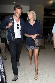 Here are 29 lovely images of this couple Taylor Swift And Tom Hiddleston Wore Matching Outfits To Lax Airport Teen Vogue