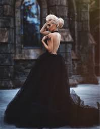 Long sleeves, portrait backs, sequins, fishtails. The Branwen Sexy Black Open Back Tulle Wedding Gown Broke Bride Dresses