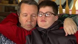 A teacher is raising a former student with Down syndrome after his mom died  of cancer