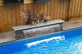 25 tons of boulders on the pool! 8 Pool Water Bowls Waterfalls Ideas Pool Water Features Pool Landscaping Backyard Pool