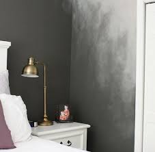 These patterned painted walls have all the charisma of wallpapered ones—but for a fraction of the cost. Smokey Feature Wall Look Ombre Wall Wall Design Wall Painting Techniques