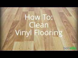 How To Clean Vinyl Floors 4 Easy Steps Oh So Spotless In 2021 Vinyl Wood Flooring Cleaning Vinyl Floors Vinyl Wood Planks