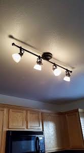 How To Replace A Fluorescent Light With A Track Light Track Lighting Kitchen Lighting Makeover Farmhouse Track Lighting