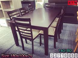 wood dining table for 8 person size 180x100x75 brown color new made in malaysia price 140 bd طاولة طعام خشب ل 8 اشخاص ل dining table decor home decor
