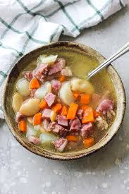 Delicious Homemade Ham Bone Soup From Leftover Ham Cooked On The Stove Made With Beans Potatoes Car Ham Bone Soup Homemade Vegetable Soups Leftovers Recipes