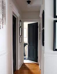 A Connecticut Home With A Black And White Spin Design Sponge Black Interior Doors White Interior Doors Paint Doors White