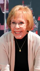 Comedy legend Carol Burnett puts her handprints in cement outside of  Hollywood's famed TCL Chinese Theatre.