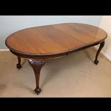 Vintage solid mahogany extending round jupe dining table with cabinet & fittings. Antique Victorian Georgian Edwardian Furniture The Antique Shop