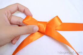 How do you make a bow with a wired ribbon? How To Tie A Beautiful Ribbon Bow One Dog Woof