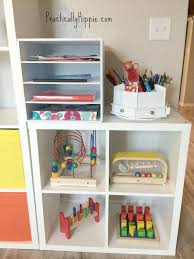 On either end of the couch. Our Bright Cheerful Ikea Playroom Rooted Childhood