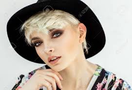 Sometimes it feels like chic hats and short hair do not work together but we can prove that it works. Portrait Of Beautiful Young Woman With Short Hair And Hat Stock Photo Picture And Royalty Free Image Image 108023695